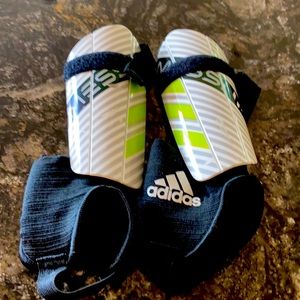 Adidas size small shin gards.